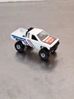 Hot Wheels Nissan Hardbody 4x4 -  1987  White Vintage