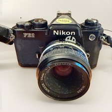 Nikon FE2 35mm SLR Camera Kit w/ 28mm 50mm Nikkor Lenses Untested