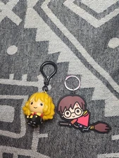 Harry Potter On A Broom Playing Quidditch and Hermoine Figure Keychains Lot of 2