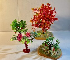 Lot of three plastic assorted garden trees. Diorama or playset.
