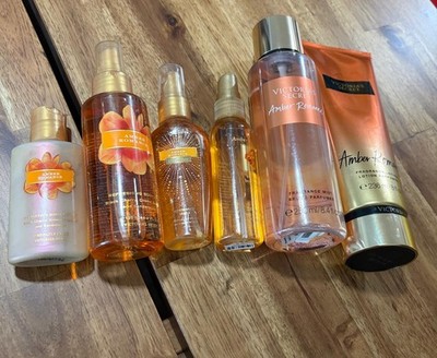 Victoria's Secret Amber Romance Mist, Shimmer, Body Lotion and Dust VS Bag.