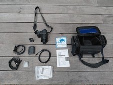Olympus C-8080 Wide Zoom Digital Camera with Lens Cap, Battery, and Strap