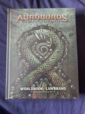 AUROBOROS: COILS OF THE SERPENT - WORLDBOOK-LAWBRAND (RPG HARDCOVER) NEW/SEALED