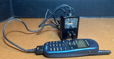 Vintage Motorola phone Timeport tri-band with Charger turns On  charges
