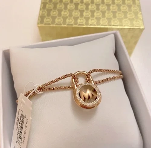 Michael Kors Bracciale Slider Lucchetto Pavé Oro Rosa MK Logo MKJ7382791