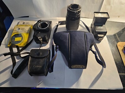 Canon T50 35mm Camera W/ Strap & Camera Bag Plus Canon T70 w/ Extra Lens / Flash