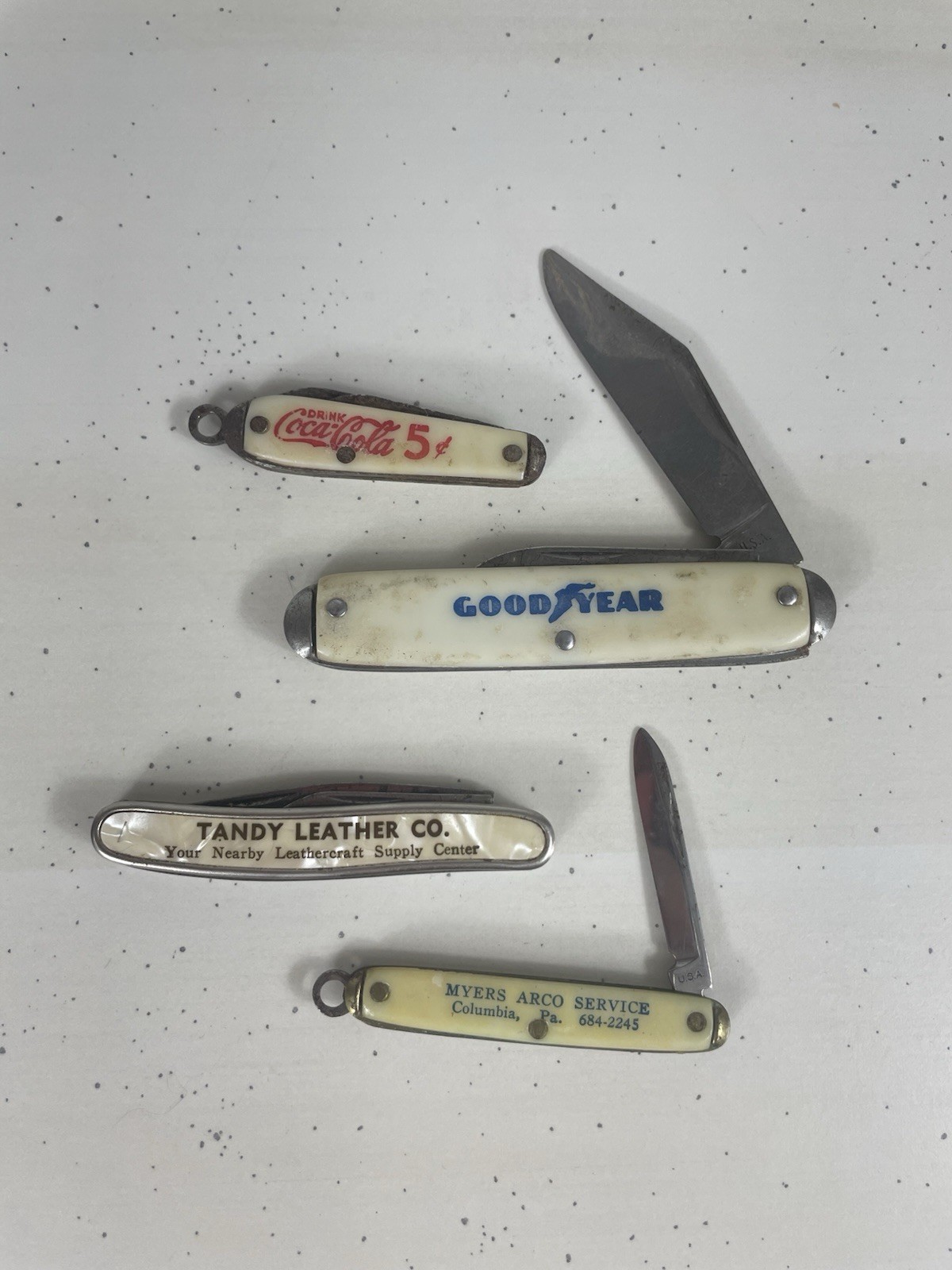 Lot of 4 Vintage Advertising Pocket Knives Coca Cola, Good Year And More