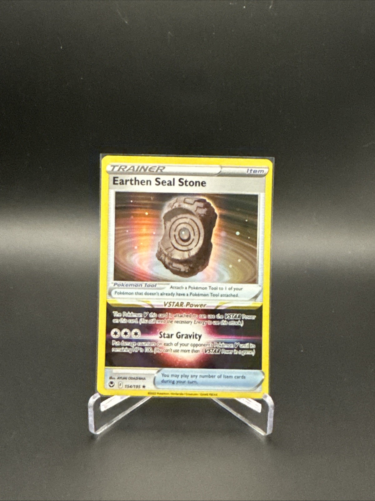 Earthen Seal Stone 154/195 Swsh12: Sword & Shield - Silver Tempest Holo
