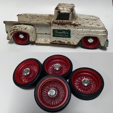 Tonka 4 Printed Wire Wheels and Tires. Caps Included. Truck Not Included.