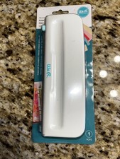 We R Memory Keepers Adjustable 6-Hole Punch Brand new in packaging.