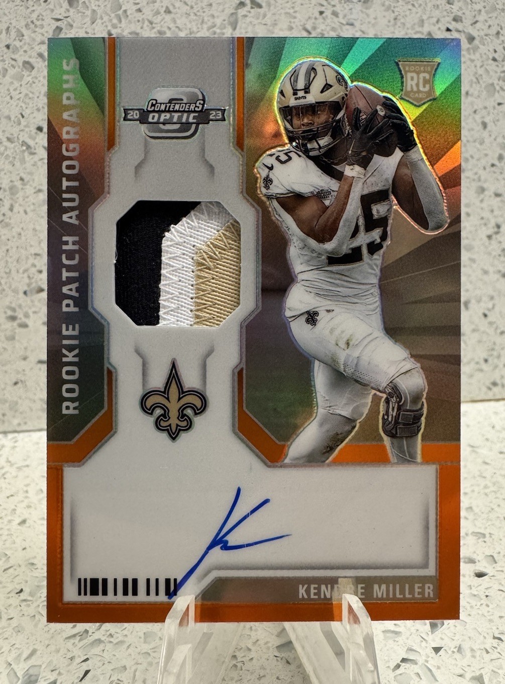 2023 Panini Contenders Optic - Rookie Patch Autographs Kendre Miller /25 Orange