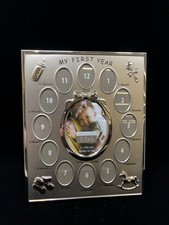 MY FIRST YEAR SILVER PHOTO FRAME.