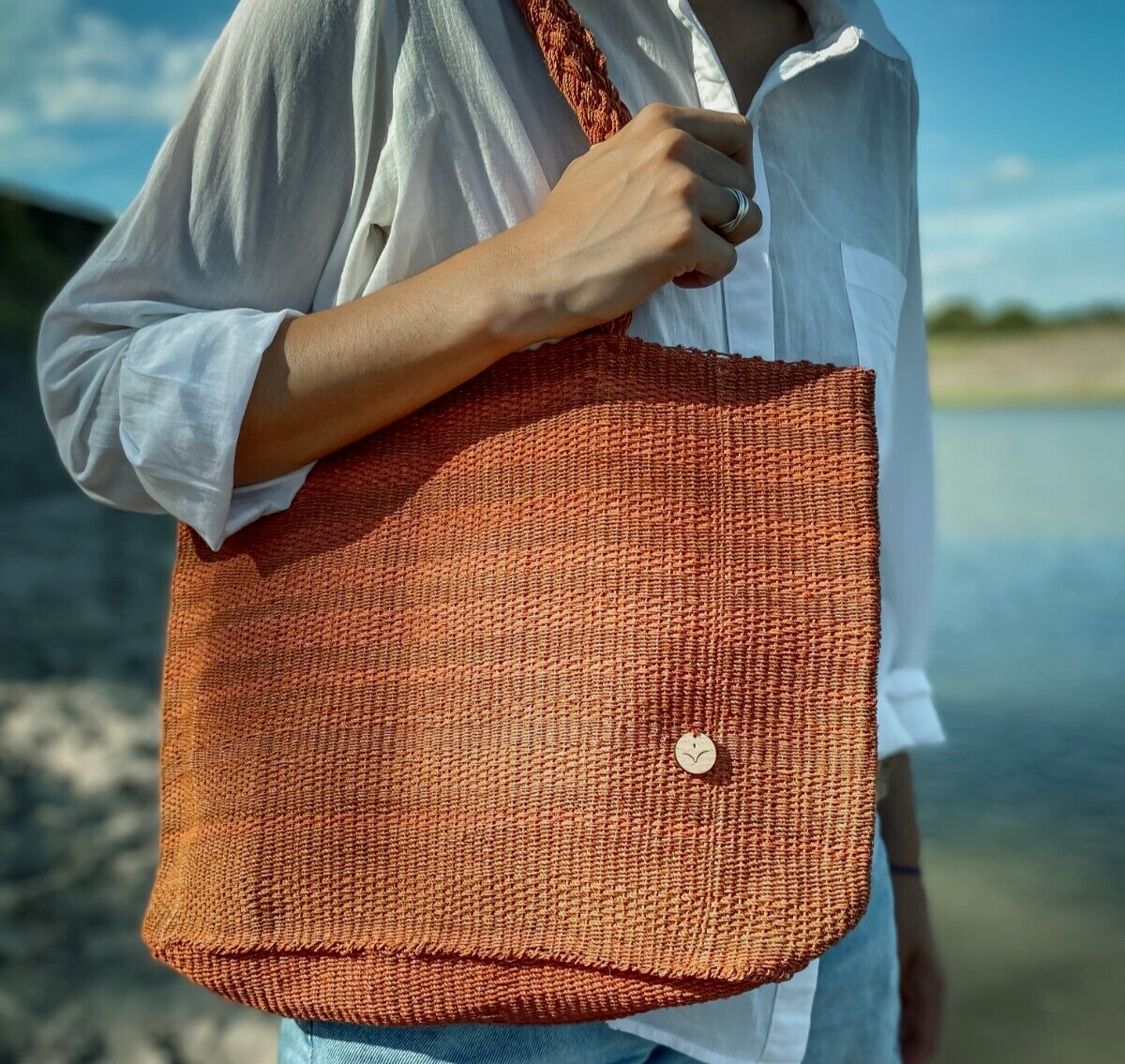 Natural handmade orange shoulder bag in eco-friendly fiber-image