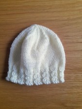 New hand knitted cream cable border baby hat size 0-3 months