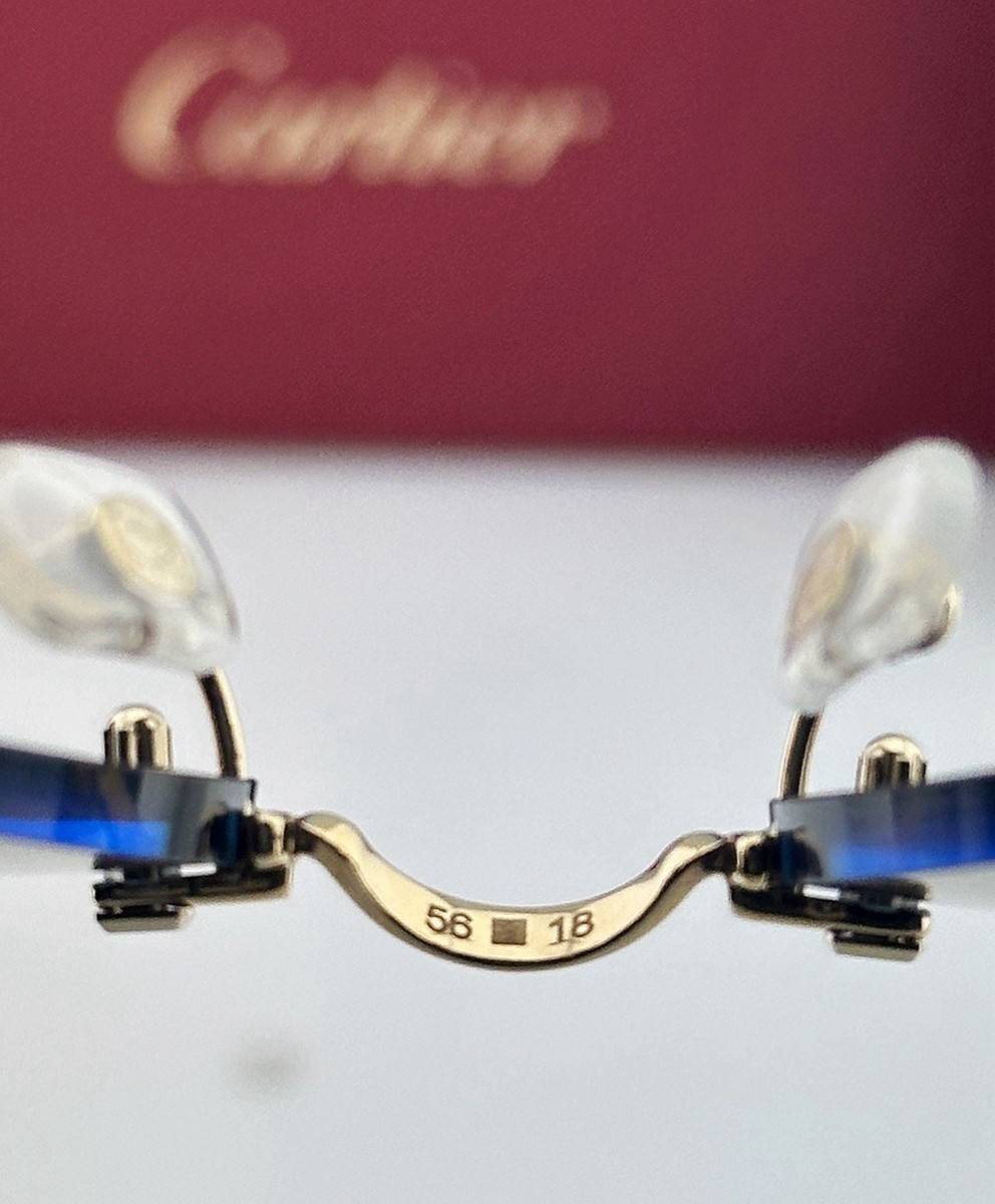 Cartier CT0550S 002 Rimless Sunglasses Gold Rimless Blue  display picture 2