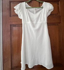 All in Favor white baby doll dress. M