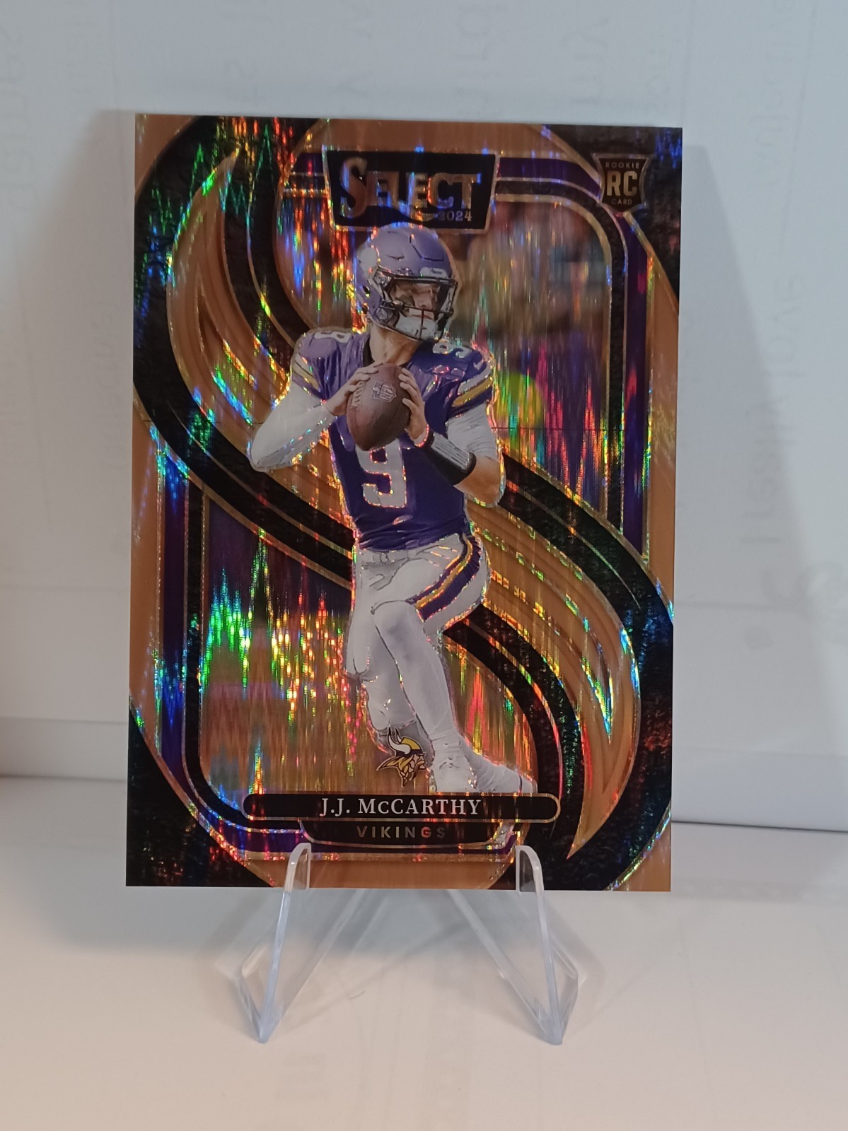 2024 Panini Select - Premier Level J.J. McCarthy #134 Bronze Prizm /299 (RC)