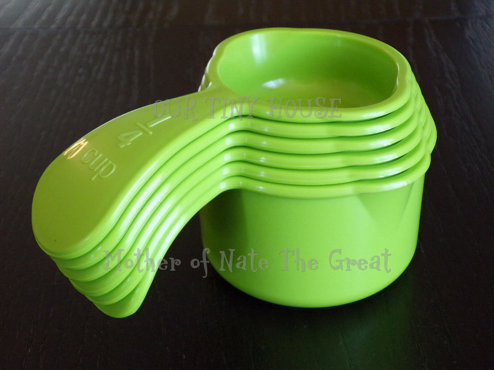NEW Tupperware Measuring Cups Set of 6 GREEN Curved Embossed Handle Baking Tools
Opens in a new wind