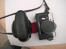 Vintage Zenit EM 35 mm film camera Carl Zeiss Jena Tessar 2.8/50 lens and case