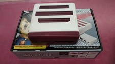 Used, Japan-sourced Retro Freak CY-RF-RW — the iconic red-and-white colorway that echoes the original Famicom, making it a display-worthy collector piece.