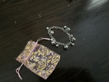 Silver Christmas Bracelet With Bells On It