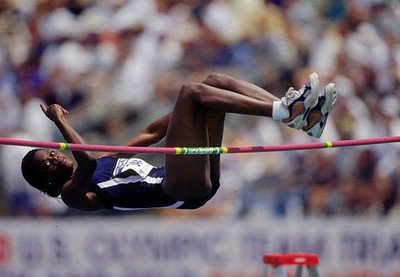 Stacy-Ann Grant US Leaps over the bar in the Womens High Jump Fina- Old Photo