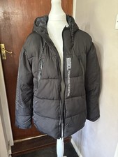 Woman’s Black Hood Rich Puffer Coat Size L