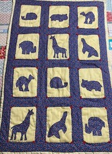 Vintage Handmade Baby Quilt Light Yellow With Flowered Animal Squares. 48  X 32