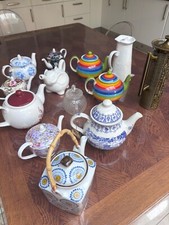 teapots job lot- Alice in Wonderland tea party 8 miniature teapots & 13 full siz