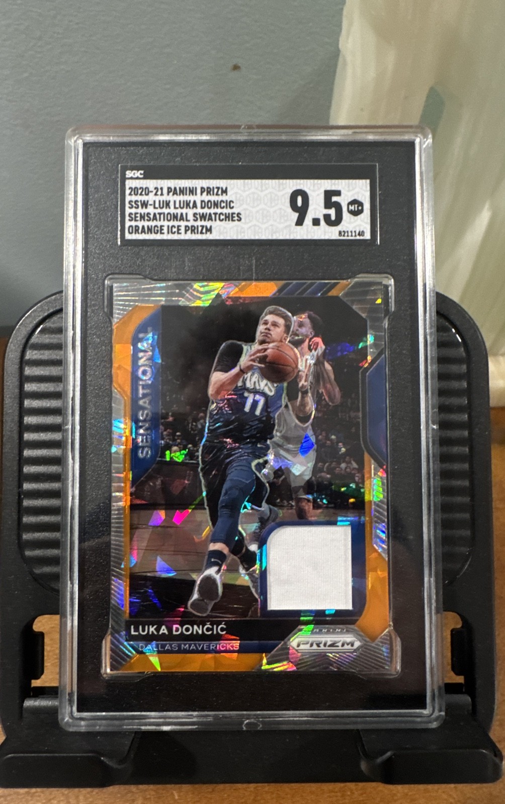2020-21 Panini Prizm Sensational Swatches Luka Doncic Orange Ice Game Worn