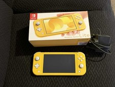 Nintendo Switch Lite Console Yellow - Comes with box and original charger 