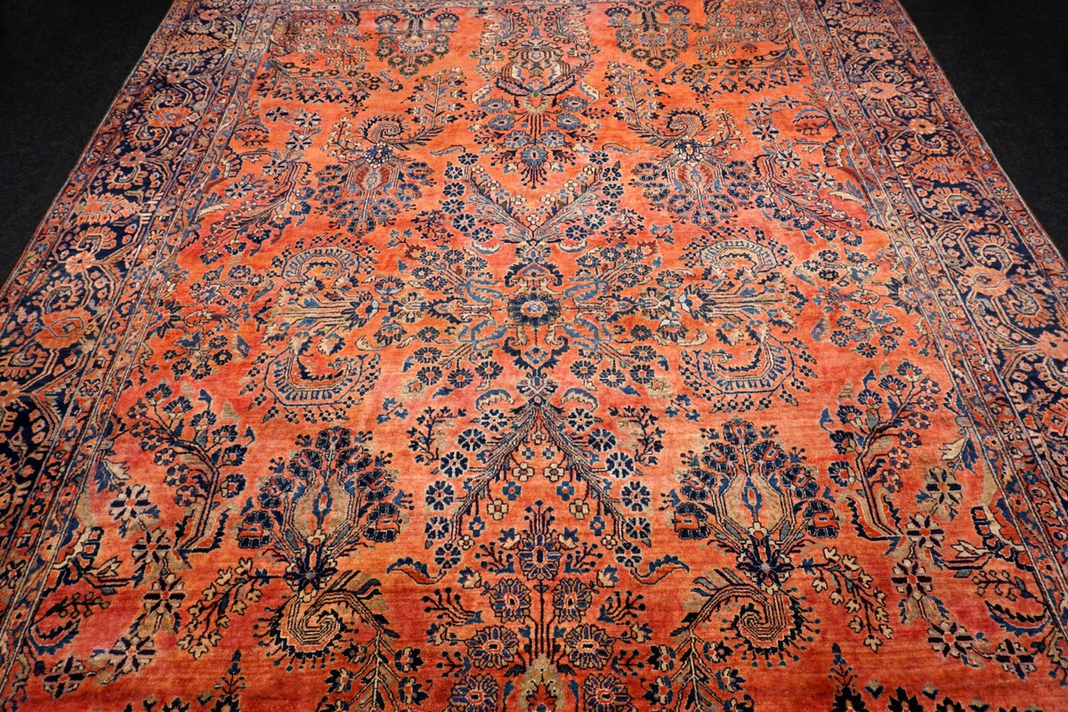 Tapis Sarough ancien 353×272 cm avec motif floral coloré, noué à la main
