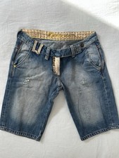 vintage low-rise medium wash distressed denim leather studded pockets Y2K shorts