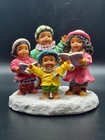 Caroling Family Figurine - 4" tall