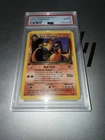 Pokémon Team Rocket Dark Charizard 1st Edition 21/82 PSA 8 Rare non-holo