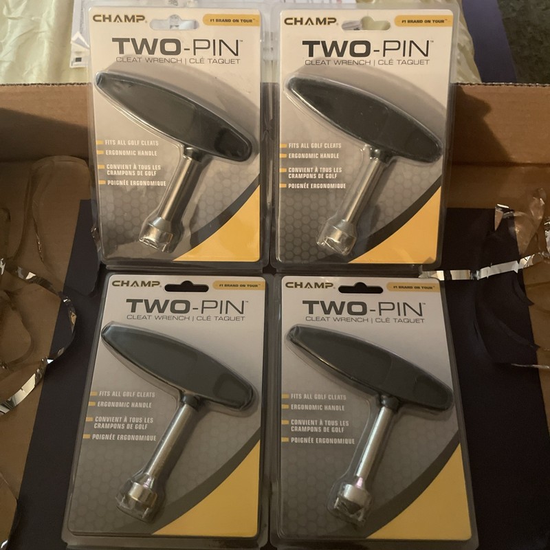 Set Of Four Champ Two-Pin Cleat Wrench.