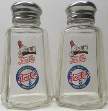 A Nice Set of Pepsi Pete & 5¢ Drink Salt & Pepper Shakers 3¾" Tall