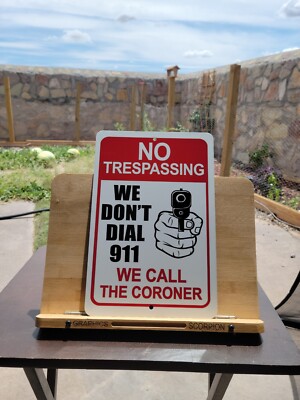 No Trespassing Sign WE DON'T DIAL 911 We Call The Coroner Aluminum Sign 8x12 in
