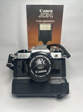 Canon AE-1 35mm SLR Film Camera with Canon 50mm f/1.8 FD Lens  Battery Pack