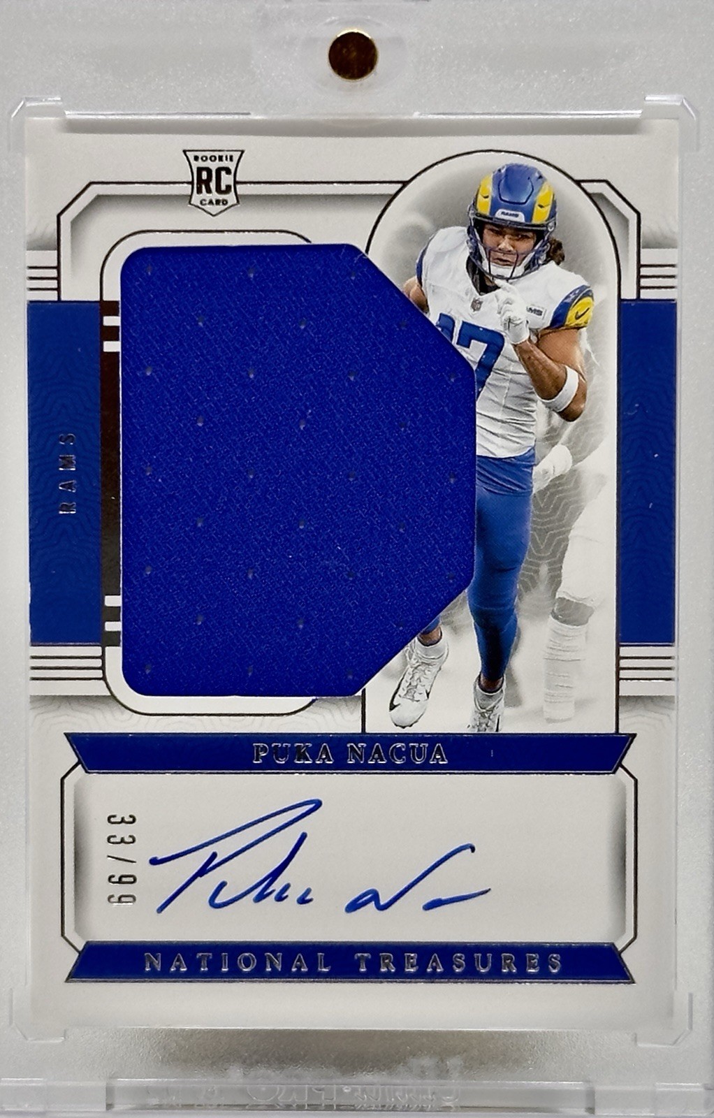 2023 National Treasures - Rookie Patch Auto Puka Nacua #183 /99 (AU, MEM, RC)
