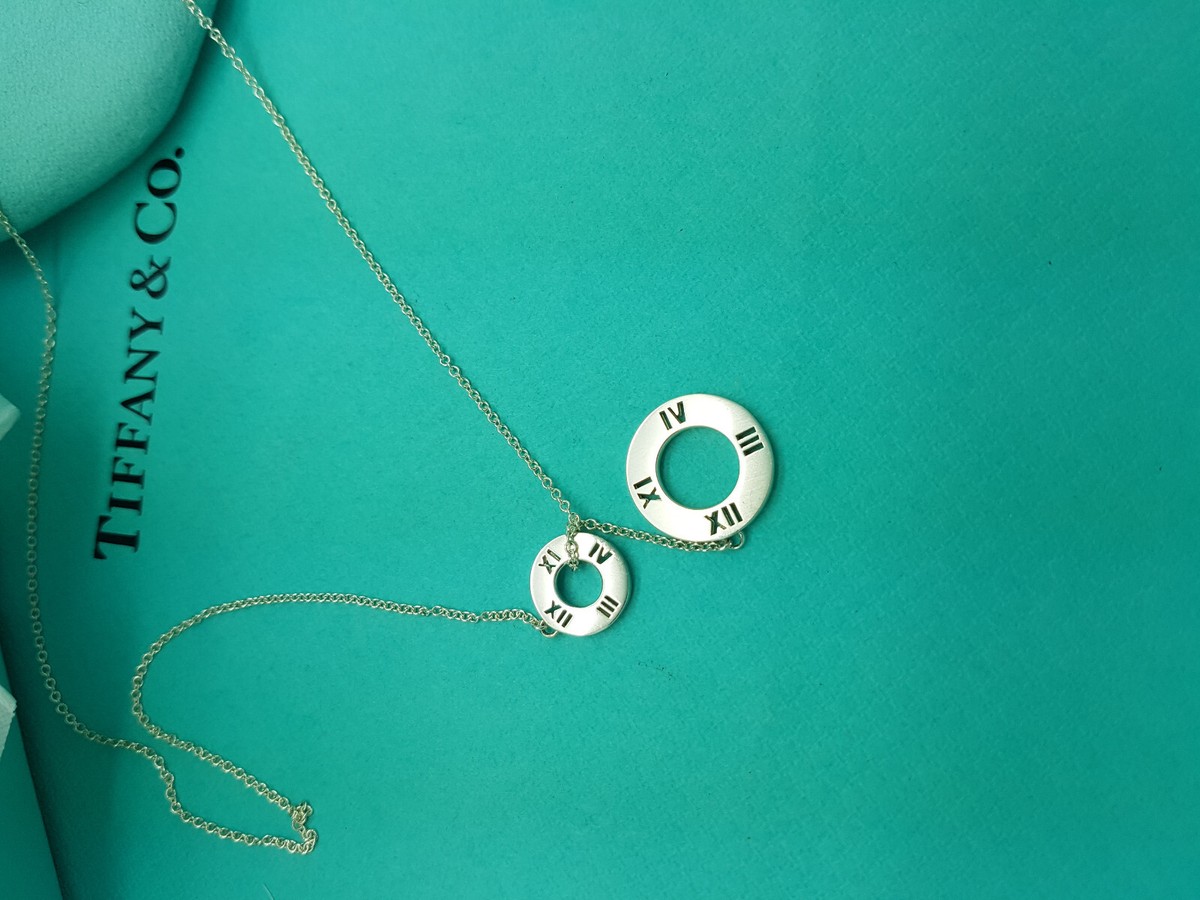 Tiffany & Co. Silver Atlas Pierced Circle Lariat Pendant 18 Tiffany & Co. Silver Atlas Pierced Circle Lariat Pendant 18