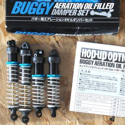 Tamiya 54028 OP.1028 Buggy Aeration Oil Filled Damper TRF501X/TRF201/DB01/TT02B - Photo 1/4