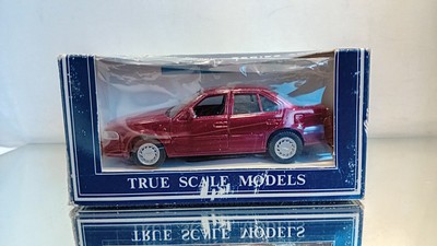 AHC 1:43 Nissan Maxima Red Metallic Near Mint In Box
