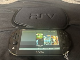 Sony Playstation vita 2000 with Games GOOD CONDITION