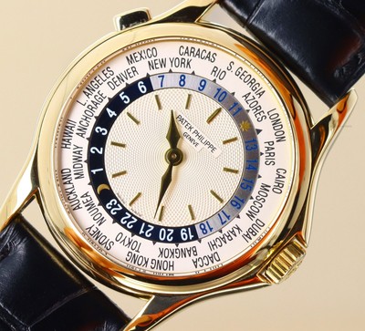Patek Philippe World Time 5110J, Guilloche Opaline Silver Dial, 18kt Yellow Gold