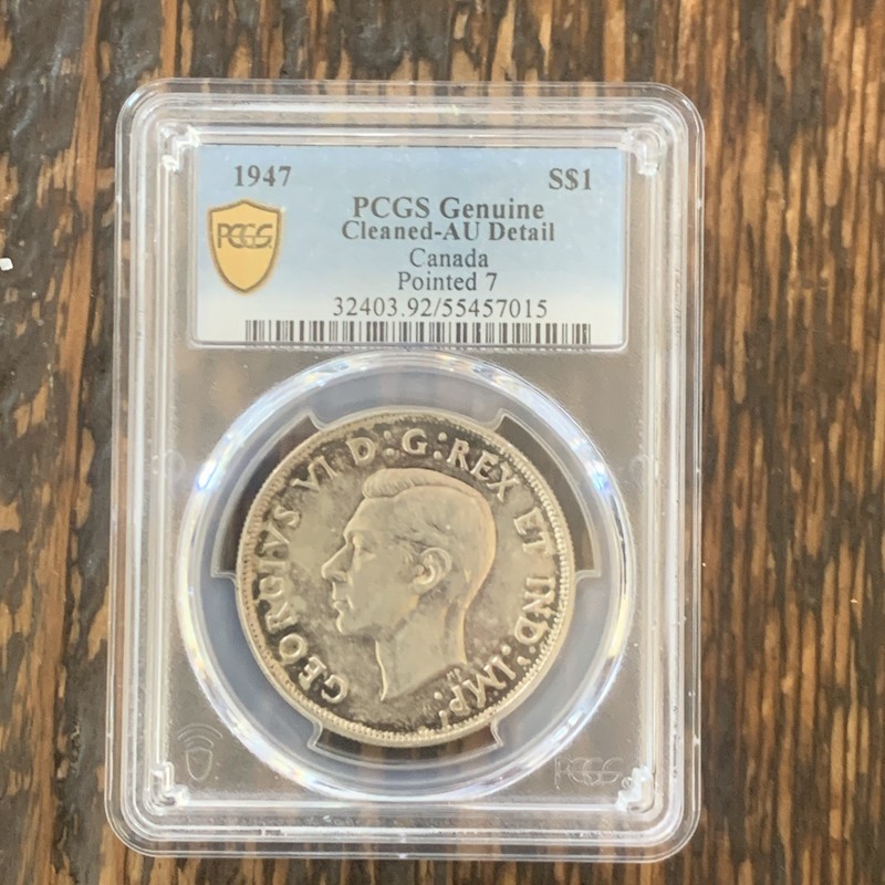 1947 PCGS Genuine AU Detail Pt. 7 Canada Silver Dollar.  Nice toning. See photos