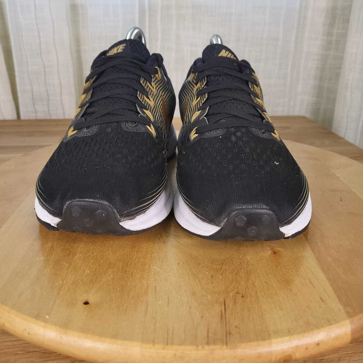 Pegasus 34 top black gold womens