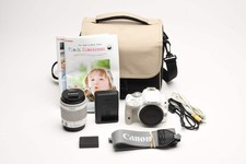 Canon SL1 w/EFS 18-55mm zoom White , case, batt charger case 4769 S.C.