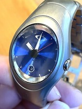 Oakley Time Bomb Icon Blue Dial Titanium Meta...