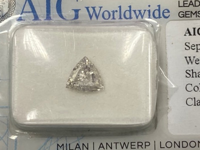 Briliant0.52 Cts. Diamond Triangle (6.56~5.98~2.35 mm) Color Grade I Clarity SI2